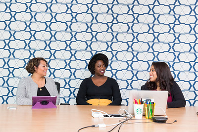 Photo of three women collaborating with laptops. Attributed to WOCinTechChat.com